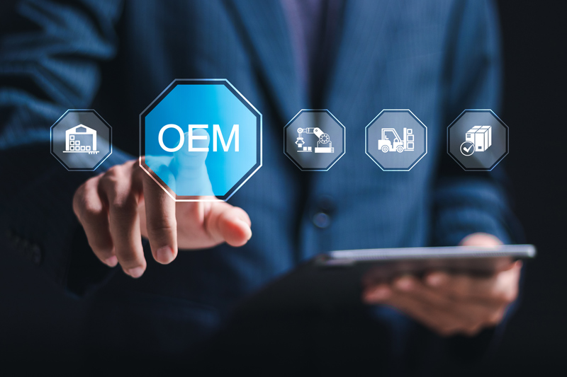 OEM or Original Equipment Manufacturer concept. Businessman touching virtual screen of OEM icon for strategies for planning product and brand production. Support to reduce cost and production time. ข้อควรรู้ก่อนเลือกโรงงานผลิต OEM